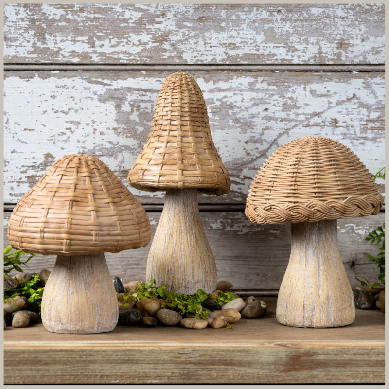 A set of three mushrooms, each with etched wood grain stems and faux wicker caps. Resin materials. Truly unique! 