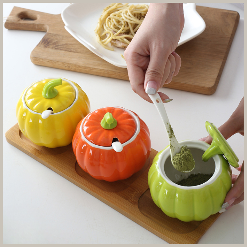 Ceramic Gourd Seasoning Jar Set shown with spices.